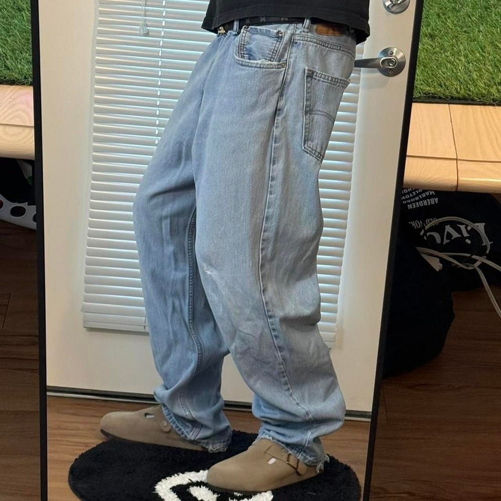Y2K Levi's 550 relaxed fit light wash jeans 40x32